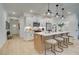 Modern kitchen with a large island and breakfast bar at 408 Carrera Ln, Acworth, GA 30102