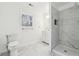 Clean bathroom, featuring a walk-in shower and white vanity at 3683 Rolling Pl, Conley, GA 30288