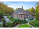 Elegant home with large backyard, landscaping, and circular driveway at 6206 Zell Miller Nw Path, Acworth, GA 30101