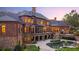 Brick estate home with stone accents, screened porch, and beautifully landscaped grounds at 6206 Zell Miller Nw Path, Acworth, GA 30101