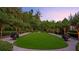 Expansive lawn, lush landscaping, and stately trees create a private oasis at 6206 Zell Miller Nw Path, Acworth, GA 30101