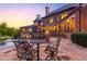 Stone patio with seating area and pool view at 6206 Zell Miller Nw Path, Acworth, GA 30101
