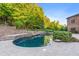 Freeform pool with stone coping and waterfall at 6206 Zell Miller Nw Path, Acworth, GA 30101