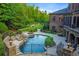 Luxury pool with spa and landscaping at 6206 Zell Miller Nw Path, Acworth, GA 30101
