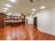 Island kitchen with dark wood cabinets and granite countertops at 6206 Zell Miller Nw Path, Acworth, GA 30101