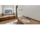 Relaxing bathroom with soaking tub, shower, and granite vanity at 6206 Zell Miller Nw Path, Acworth, GA 30101