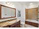 Bathroom with granite vanity, tub shower combo at 6206 Zell Miller Nw Path, Acworth, GA 30101