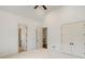 Spacious bedroom with double doors and access to hallway at 6206 Zell Miller Nw Path, Acworth, GA 30101