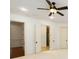Spacious bedroom with double doors and access to bathroom at 6206 Zell Miller Nw Path, Acworth, GA 30101