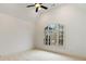 Bright bedroom with vaulted ceiling and large window at 6206 Zell Miller Nw Path, Acworth, GA 30101