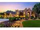 Elegant stone house with manicured landscaping and a charming driveway at 6206 Zell Miller Nw Path, Acworth, GA 30101