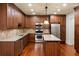 Spacious kitchen with stainless steel appliances and hardwood floors at 6206 Zell Miller Nw Path, Acworth, GA 30101