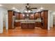 Large kitchen with dark wood cabinets and granite island at 6206 Zell Miller Nw Path, Acworth, GA 30101
