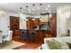 Gourmet kitchen with island, custom cabinetry, and hardwood floors at 6206 Zell Miller Nw Path, Acworth, GA 30101