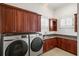 Bright laundry room with modern appliances and cabinetry at 6206 Zell Miller Nw Path, Acworth, GA 30101