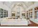 Large living room with vaulted ceilings, fireplace, and French doors at 6206 Zell Miller Nw Path, Acworth, GA 30101