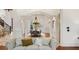 Spacious living room with plush sofa and view of the dining room at 6206 Zell Miller Nw Path, Acworth, GA 30101