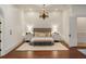 Elegant main bedroom with hardwood floors and ensuite bathroom at 6206 Zell Miller Nw Path, Acworth, GA 30101