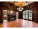 Grand office with hardwood floors, fireplace, and large windows at 6206 Zell Miller Nw Path, Acworth, GA 30101