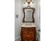 Elegant powder room with ornate vanity and mirror at 6206 Zell Miller Nw Path, Acworth, GA 30101