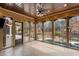 Spacious screened porch overlooks the pool and wooded backyard at 6206 Zell Miller Nw Path, Acworth, GA 30101