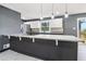 Modern kitchen island with granite countertop and pendant lighting at 2916 Handy Nw Dr, Atlanta, GA 30318