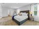 Main bedroom with plush carpeting and room for a sitting area at 749 Great Oak Pl, Villa Rica, GA 30180