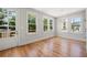 Bright dining room with hardwood floors and French doors leading to a deck at 110 Hogue St, Atlanta, GA 30312
