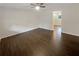 Spacious bedroom with dark brown luxury vinyl plank flooring at 2891 Hedgewood Nw Dr, Atlanta, GA 30311