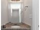 Bathroom with granite countertop and a large mirror at 116 Rolling Meadows Ct, Hampton, GA 30228