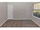 Bright bedroom with neutral walls and carpet, and window at 116 Rolling Meadows Ct, Hampton, GA 30228