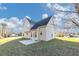 Two-story house with a patio and a spacious backyard at 116 Rolling Meadows Ct, Hampton, GA 30228