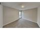 Bright and airy bedroom with neutral colored walls and carpet flooring at 2683 Meadowlawn Se Dr, Marietta, GA 30067