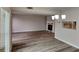 Open concept dining area with hardwood floors and a view of the living room at 2683 Meadowlawn Se Dr, Marietta, GA 30067