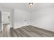 Spacious bedroom with double door closet and wood-look floors at 3328 Pepperpike Ct, Loganville, GA 30052