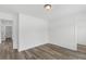Spacious bedroom featuring wood-look floors and ample natural light at 3328 Pepperpike Ct, Loganville, GA 30052