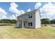 Two-story house with backyard and covered patio at 3328 Pepperpike Ct, Loganville, GA 30052
