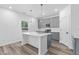 Modern kitchen with gray cabinets, white countertops, and island at 3328 Pepperpike Ct, Loganville, GA 30052