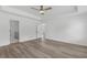 Spacious main bedroom with ceiling fan and ensuite bathroom access at 3328 Pepperpike Ct, Loganville, GA 30052