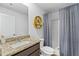 Clean bathroom with granite countertop, shower, and toilet at 819 Major Oak Ct, Villa Rica, GA 30180