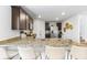 Kitchen with breakfast bar, granite countertops, and stainless steel appliances at 819 Major Oak Ct, Villa Rica, GA 30180