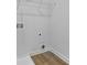 Laundry room with vinyl flooring and shelving at 819 Major Oak Ct, Villa Rica, GA 30180