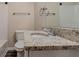 Clean bathroom with granite countertop and toilet at 329 Mount Zion Sw Rd, Atlanta, GA 30354