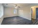 Bright bedroom with dark gray vinyl flooring and ceiling fan at 329 Mount Zion Sw Rd, Atlanta, GA 30354