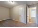 Bright bedroom with carpeting and access to hallway at 329 Mount Zion Sw Rd, Atlanta, GA 30354