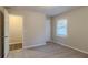 Bedroom with neutral walls, carpet, and closet at 329 Mount Zion Sw Rd, Atlanta, GA 30354