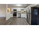 Modern kitchen with white cabinets and stainless steel appliances at 329 Mount Zion Sw Rd, Atlanta, GA 30354