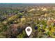 Aerial view showing home location near a golf course at 3957 Lake Forrest Ne Dr, Atlanta, GA 30342