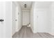 Clean hallway with light gray vinyl flooring at 3957 Lake Forrest Ne Dr, Atlanta, GA 30342