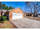 Attached garage with ample parking space at 7169 Woodridge Ln, Union City, GA 30291